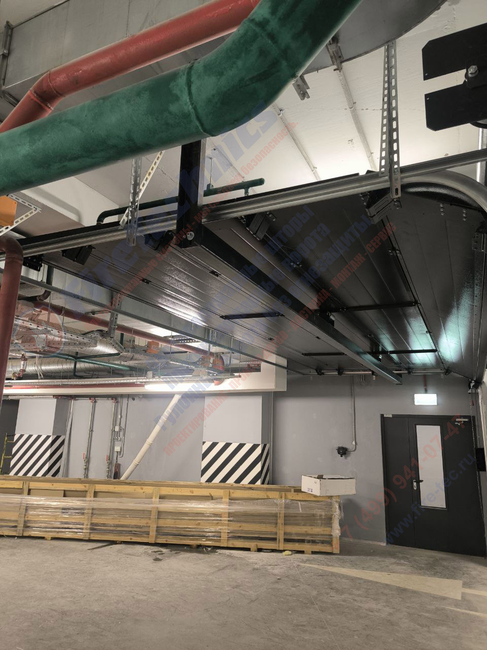 Секционные противопожарные ворота FireTechnics-S EI60 в паркинге ЖК